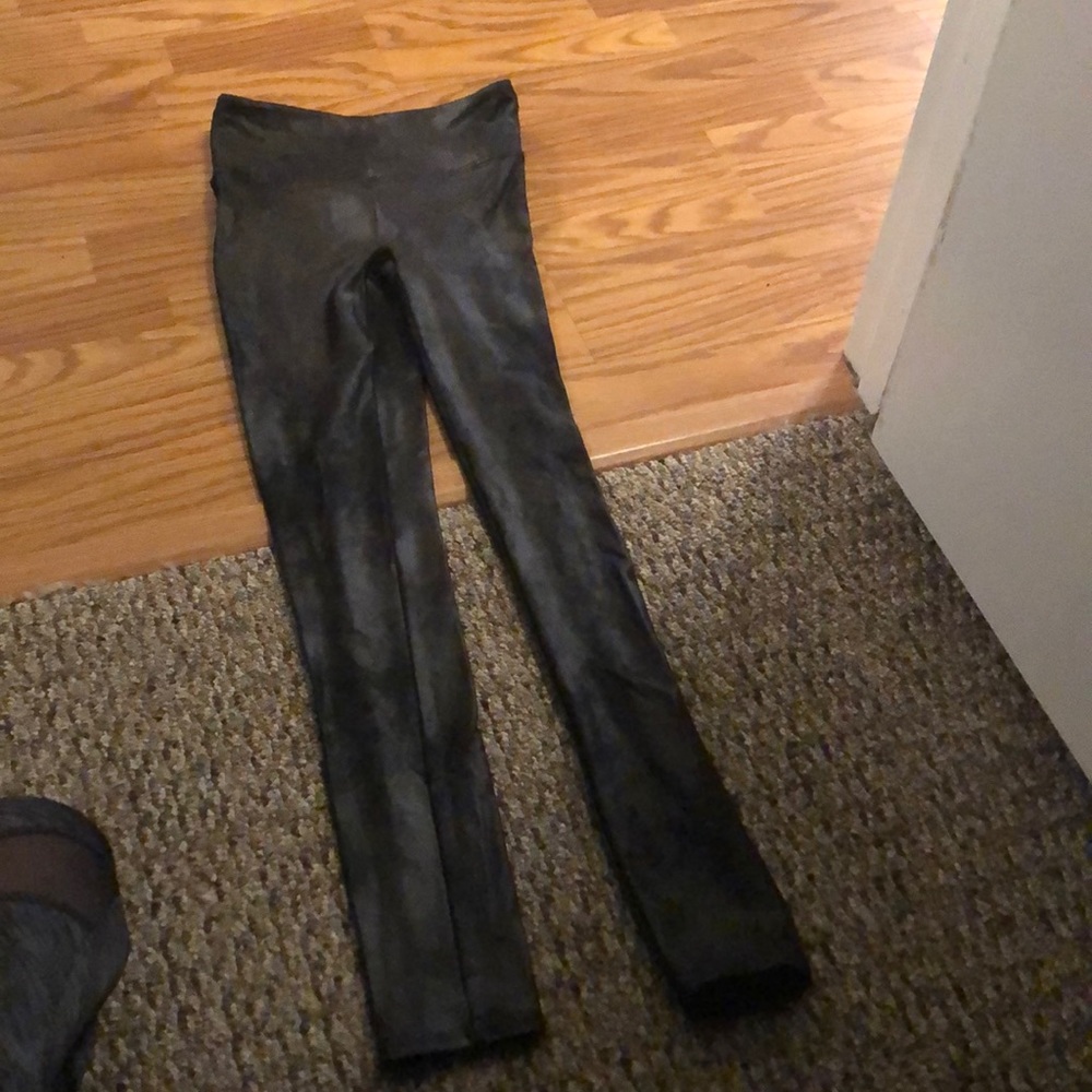 Leather like material , black tight leggings